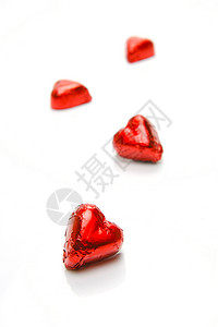 巧克力爱心糖果食物红色白色背景图片