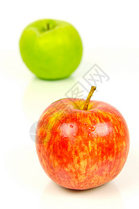 红和绿苹果绿色白色红色食物背景图片