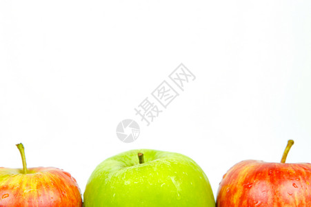 红和绿苹果白色红色食物绿色背景图片