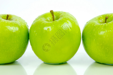 绿色苹果白色食物背景图片