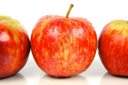 红苹果白色食物红色背景图片