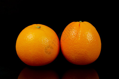 橙子黑色食物橘子水果背景图片