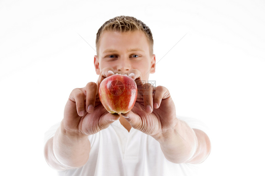 男性用双手握着苹果图片