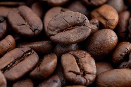 咖啡豆烘烤裂缝豆子咖啡粮食背景图片