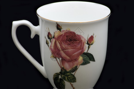 黑色的白杯早餐白色咖啡玫瑰背景图片
