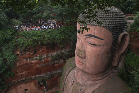 佛山腰雕像纪念碑旅游遗产岩石石头悬崖旅行洞穴背景图片
