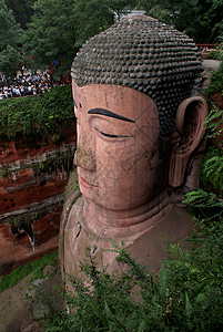 佛悬崖宗教岩石旅行历史地标雕像雕刻爬坡上帝背景图片