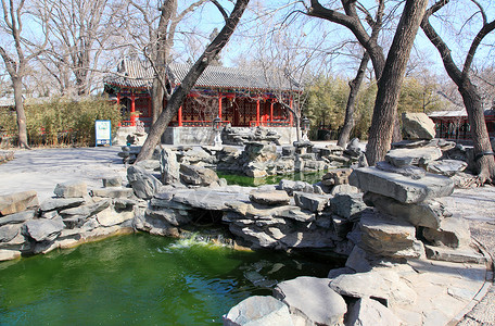 乾隆花园北京的宫子公公文化房子池塘王朝历史皇帝狮子住宅城市公园背景