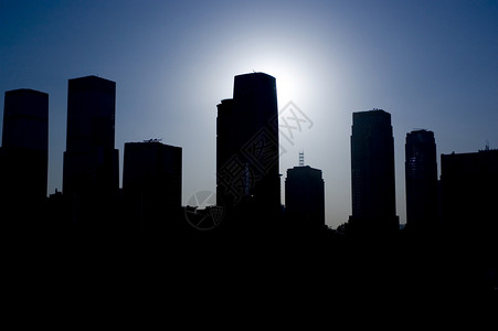 深圳  城市风景摩天大楼日落黑暗建筑物太阳蓝色天空城市背景图片