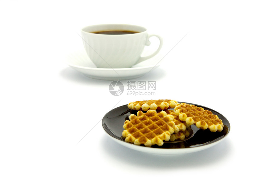 饼干和咖啡杯小吃拿铁飞碟午餐桌子杯子茶点咖啡店陶器餐厅图片