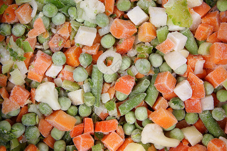 冷冻蔬菜青豆玉米菜花白色餐厅蔬菜产品背景图片