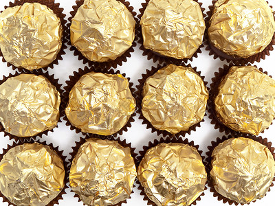 松露团体黄色奶糖糖果甜点巧克力金子背景图片