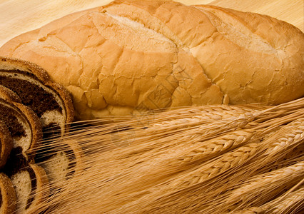 金面王朝面包面脆皮谷物食物面包粮食酵母农作物面团面粉砧板背景