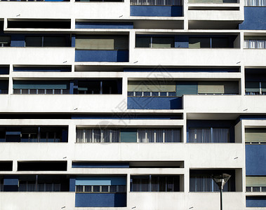 现代面孔白色建筑学建筑蓝色公寓背景图片