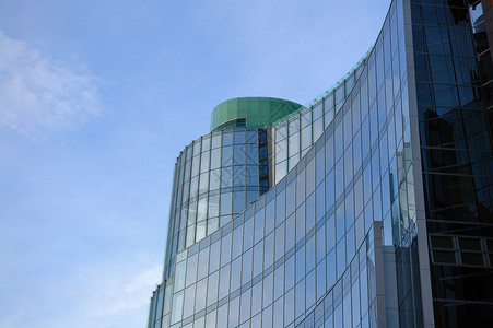 商业建筑建设城市市中心镜子蓝色高楼金融摩天大楼建筑学办公室中心背景图片