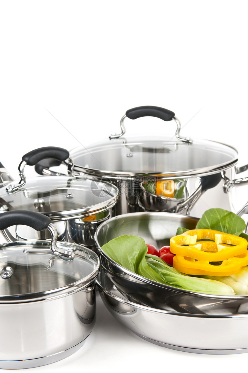 不锈钢锅和有蔬菜的锅厨房炊具厨具食物盖子烹饪发泄把手煎锅烤箱图片