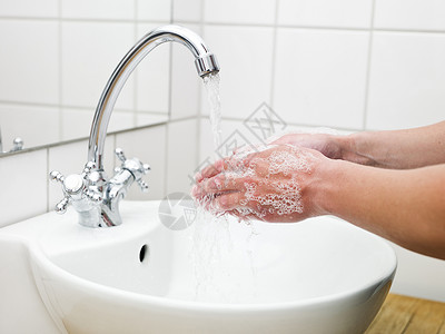 洗手关龙头洗手人类肥皂水卫生生活方式身体飞溅浴室护理打扫液体背景