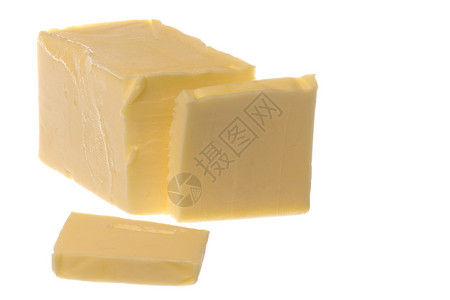 孤立的黄油黄色传播食物小吃宏观奶制品奶油状育肥背景图片