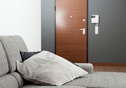 公寓软垫沙发电话装饰长椅风格枕头家具房间背景图片
