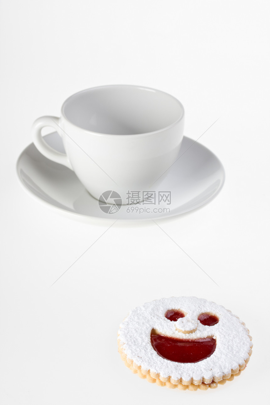 笑着的饼干和咖啡杯 孤立在白色背景上食物眼睛糖果笑脸糖霜蛋糕糕点小吃微笑图片