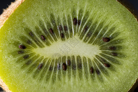切碎的基维水果植物奇异果绿色背景图片