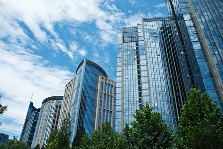 市商业区城市现代化玻璃钢商圈市中心建筑物蓝天白云玻璃墙背景图片