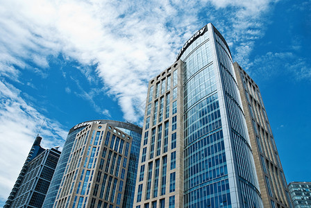 市商业区建筑学商圈现代化白云市中心城市玻璃钢蓝天建筑物背景图片