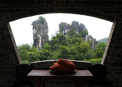 中国的桂林风景树木家园旅行框架日落顶峰劳动石头爬坡窗户背景图片