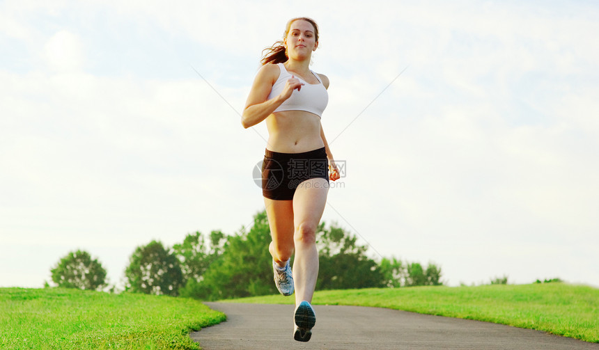 美丽的女选手成人运动活力火车力量训练赛跑者跑步娱乐图片