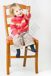 孩子坐在椅子上孩子们风尚工作室背景图片
