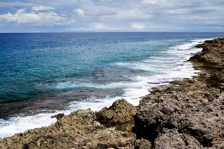 珊瑚珊瑚礁岩石海岸线蓝色天空沿海假期热带风景支撑海景天堂石头图片