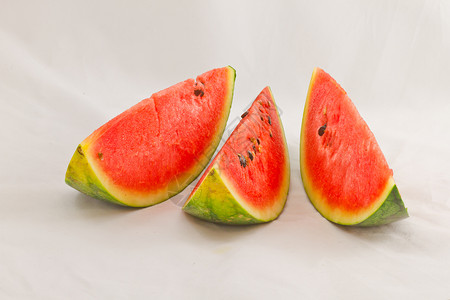 西瓜片白色食品健康水果西瓜糖果种子饮食绿色红色新鲜的高清图片素材