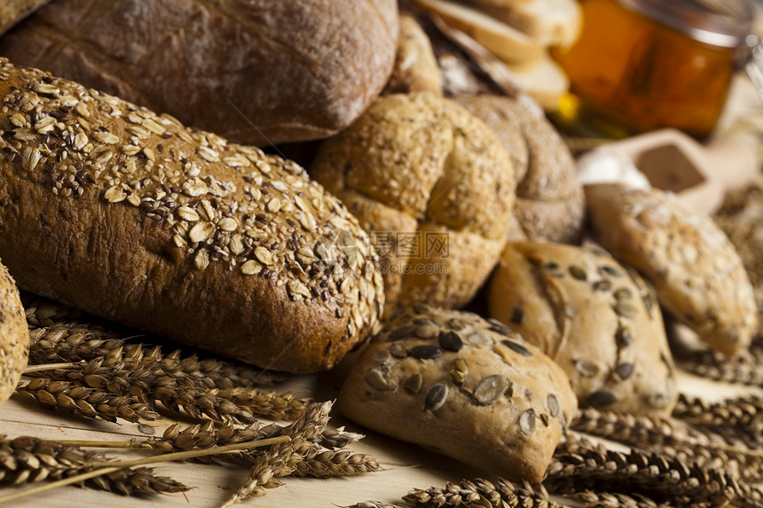 备份货物面包收获烘烤收成大麦农民饮食面团谷物植物图片