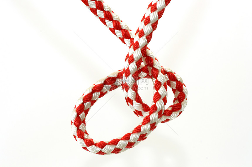 红色和白色绳索紧张力量纤维节点黄麻难点宏观环形图片