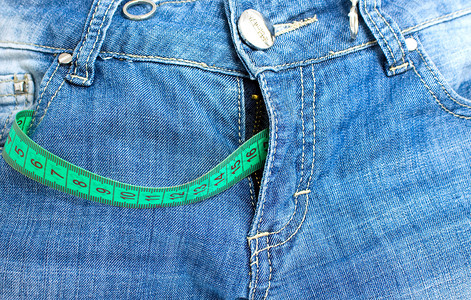 牛仔裤绿色牛仔布仪表裤子磁带纺织品尺寸拉链口袋衣服背景图片