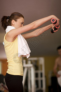 工作妇女杠铃女子女人肖像健康生活女士面孔举重的女人健身房运动背景图片