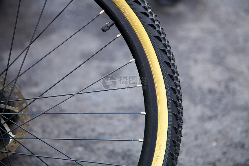 自行车轮插头自行车阀门中心运动插图红色齿轮黑色金属图片
