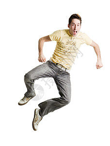 年轻成年男子在白色背景下跳入空气中背景图片