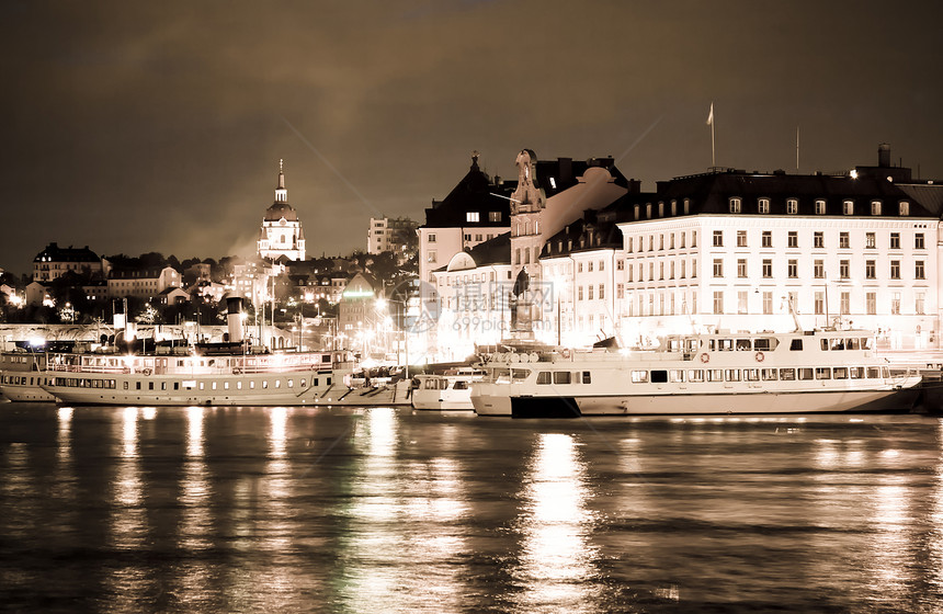 斯德哥尔摩市夜幕现场窗户城市运输棕褐色公园蓝色地区码头建筑天空图片