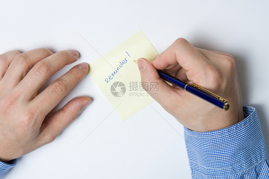 书面写作的人商业经理笔记本记事本草稿蓝色圆珠笔推介会职业人士图片