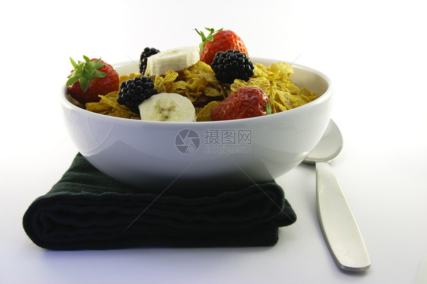 玉米花和水果 与Napkin和Spoon食物勺子饮食蜂蜜牛奶玉米营养玉米片餐巾早餐图片
