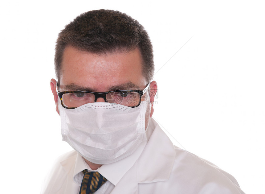 戴眼镜和保护面罩的医生图片