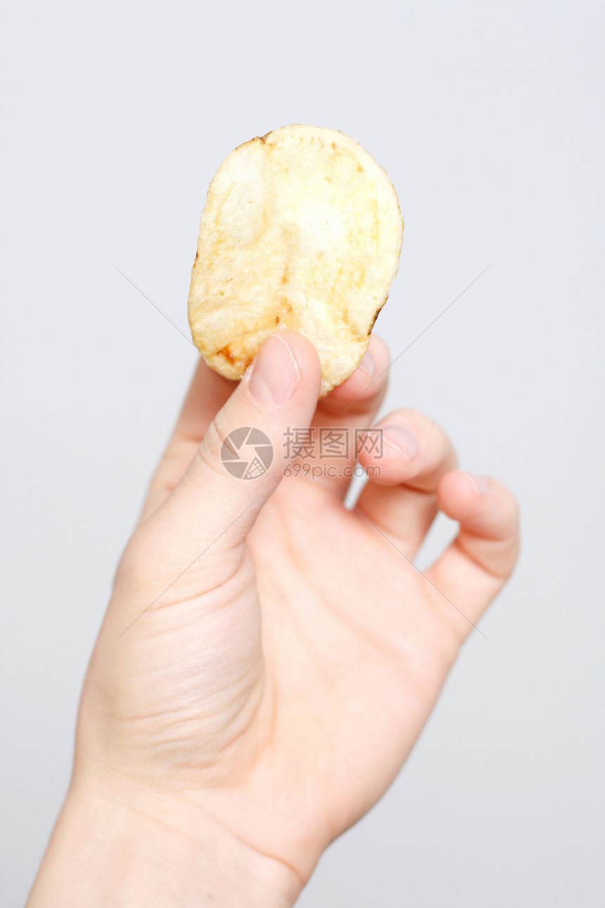 堆成薯片土豆盐渍食物诱惑小吃筹码紧缩育肥手指饼干图片