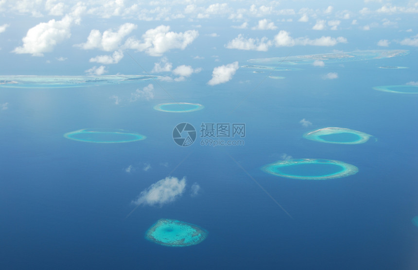 飞机对马尔代夫群岛的观察空气假期航程蓝色场景天空天堂车辆运输旅行图片