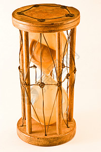旧沙漏玻璃时间白色倒数手表古董滴漏乐器概念阴影背景图片
