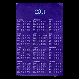 2011年哥特日历紫色字体黑色字符羊皮纸背景图片