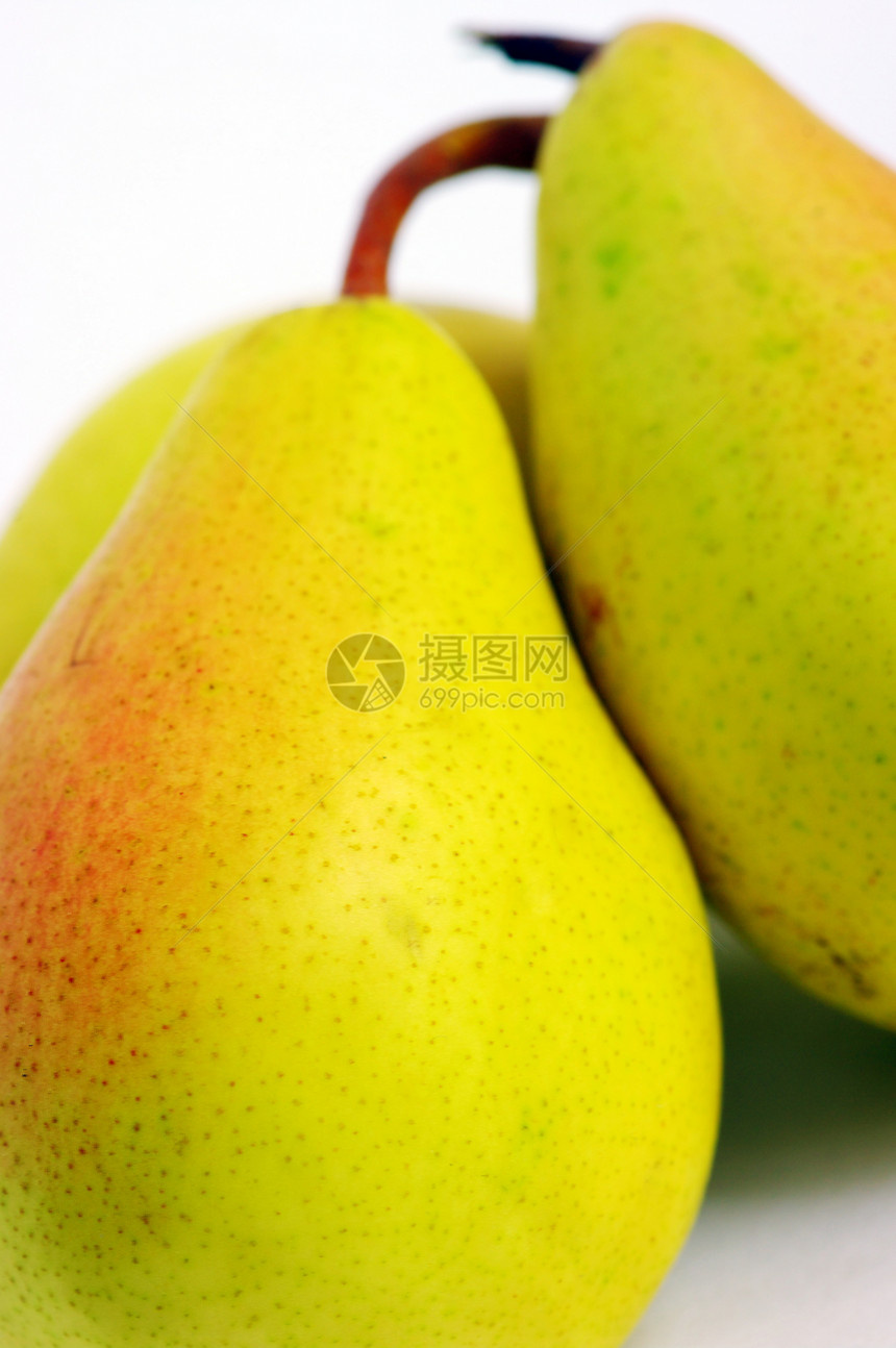 白色背景上隔离的黄黄色梨闭合工作室食物饮食花园甜点水果植物小吃健康营养图片