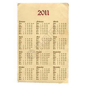 2011年哥特日历羊皮纸字符字体棕色背景图片