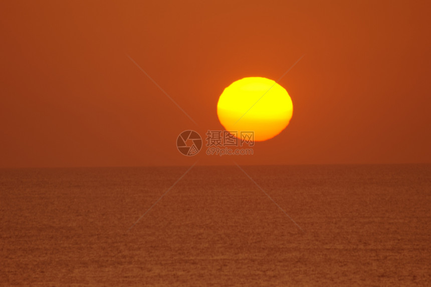 日落海洋橙子地平线太阳海浪红色图片
