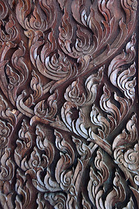 雕刻的泰泰木木制寺庙手工业手工木头艺术崇拜背景图片